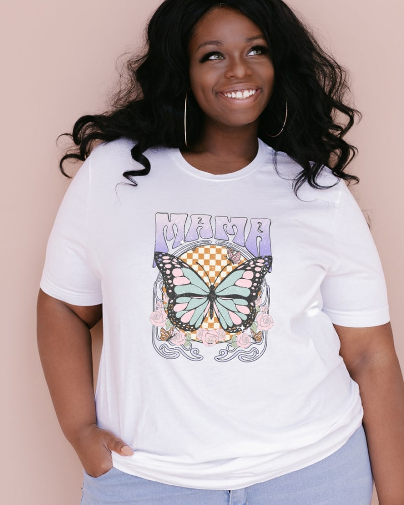 Front of a model wearing a size XL Mama Butterfly Short Sleeve Graphic Tee in White by Simply Sage Market. | dia_product_style_image_id:284243
